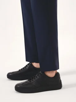Czarne skórzane sneakersy z gumą na pięcie